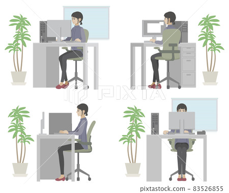 A woman who works a computer at the office 83526855