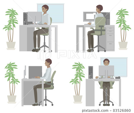 A man working on a computer in the office A man working on a computer in the office 83526860