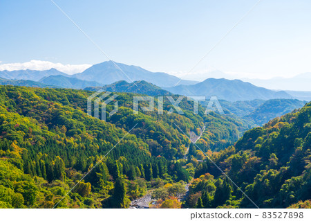 Overlooking the Kawamata River valley from the Yatsugatake Kogen Ohashi Bridge 83527898