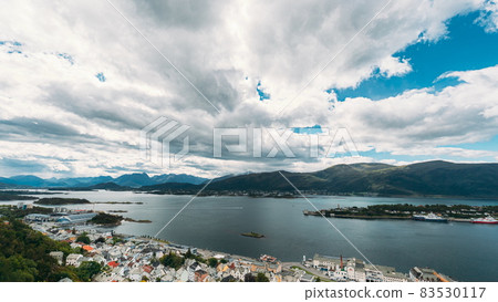 Alesund, Norway. Amazing Natural Bright Sunset Dramatic Sky In Warm Colours Above Alesund Islands. Famous Norwegian Landmark And Popular Destination. Top View. 4K 83530117