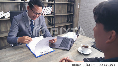 Job HR applicants having an interview with Human resource manager jobs interviewing with confident candidate at business firm office give cv resume. Job Interview with headhunter agent and applicant 83530393