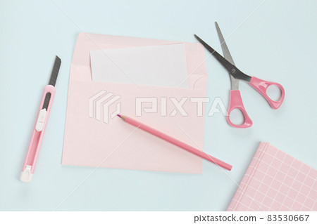 flat lay pink letter and stationery 83530667