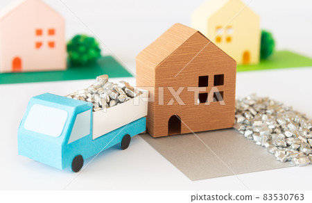 Laying gravel in exterior construction work. Creating a garden with good drainage using gravel. Controlling weeds with gravel. 83530763
