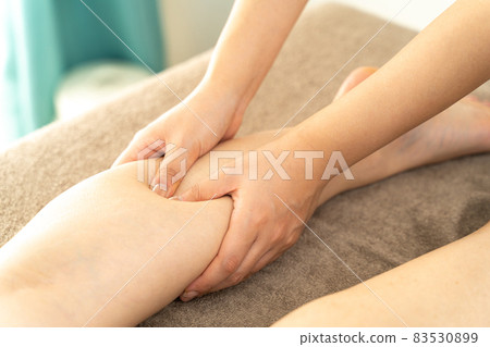 Massage your legs with a beauty treatment 83530899