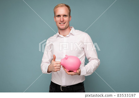 Portrait of happy positive smiling young handsome blond male businessman with sincere emotions Portrait of happy positive smiling young handsome blond male businessman with sincere emotions 83533197
