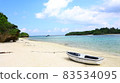 Kabira Bay in the cloudy sky and a boat on the beach 83534095