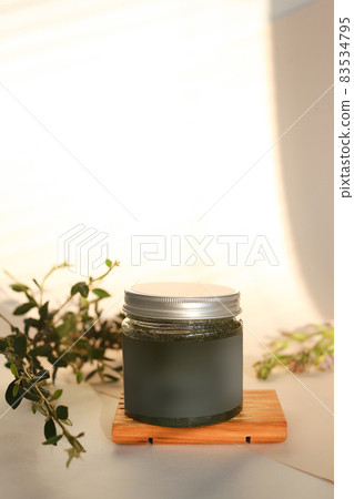 plastic jar with cream and lid isolated on neutral light background. Beauty spa and taking care of skin product plastic jar with cream and lid isolated on neutral light background. Beauty spa and taking care of skin product 83534795
