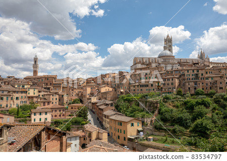 Panoramic view of Siena city with historic buildings and street Panoramic view of Siena city with historic buildings and street 83534797