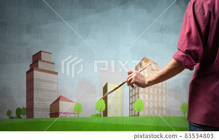Close up artist hand holding paintbrush Close up artist hand holding paintbrush 83534803