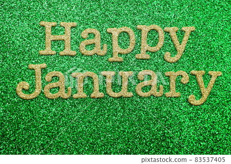 Hello January alphabet letters on green glitter background Hello January alphabet letters on green glitter background 83537405