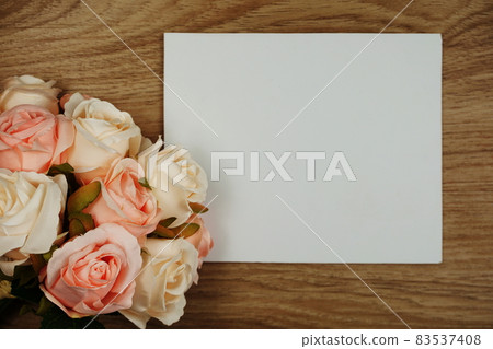 Rose Flowers bouquet with space copy arrange for decoration on wood background Rose Flowers bouquet with space copy arrange for decoration on wood background 83537408