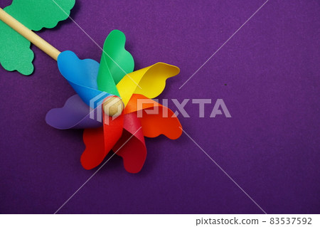 colorful pinwheel with space copy isolated on purple background 83537592