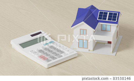 太陽能電池板放置在平面上的微型房屋和計算器 83538146