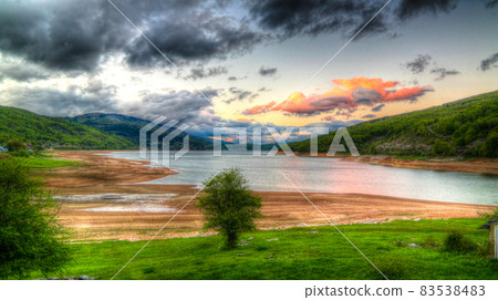 sunset Landscape of Mavrovo national park with mountain and lake, FYR Macedonia 83538483
