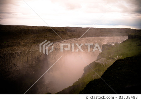 Landscape with Dettifoss waterfall in Jokulsargljufur national park, Iceland Landscape with Dettifoss waterfall in Jokulsargljufur national park, Iceland 83538488