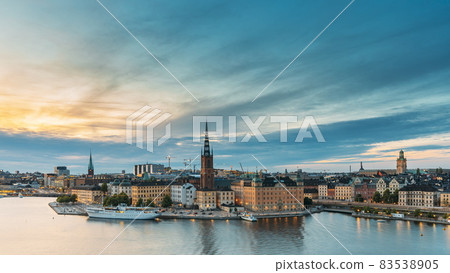 Stockholm, Sweden. Scenic View Of Stockholm Skyline At Summer Evening. Famous Popular Destination Scenic Place In Dusk Lights. Riddarholm Church In Day To Night Transition Time Lapse 83538905