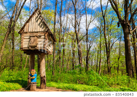 Wooden fairytale house of Baba Yaga in the Krasnokutsk park, Kharkiv region, Ukraine Wooden fairytale house of Baba Yaga in the Krasnokutsk park, Kharkiv region, Ukraine 83540843