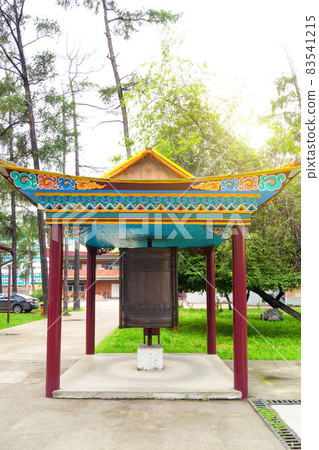 A drum for spinning and reciting prayers to God in a Buddhist temple 83541215