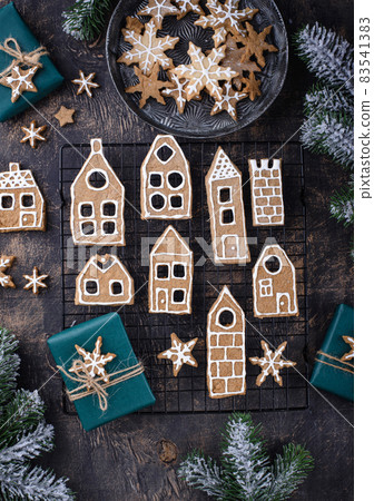 Christmas cookies in shape of gingerbread house Christmas cookies in shape of gingerbread house 83541383