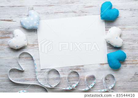 Flat lay composition with blue love hearts 83544410