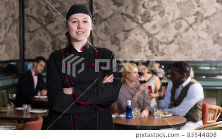 Confident professional female chef 83544808