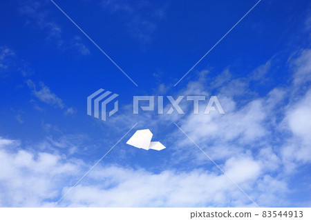 Paper plane flying in the sky Paper plane flying in the sky 83544913