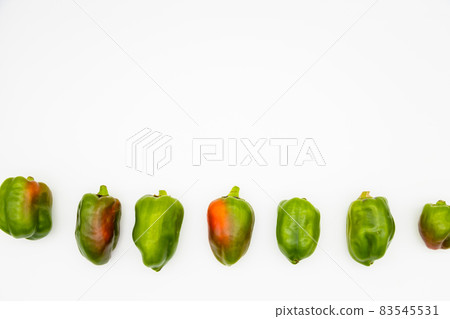 Bell peppers lined up in a row Bell peppers lined up in a row 83545531