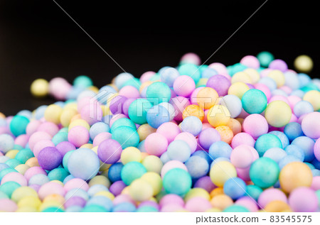 Foam beads of various colors brightly colored. Foam beads of various colors brightly colored. 83545575