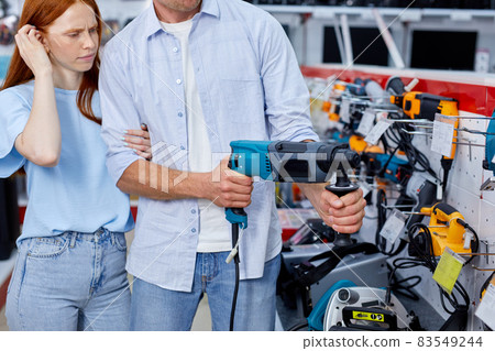 Adorable Lady Doesn't Understand Anything About Household Tools 83549244