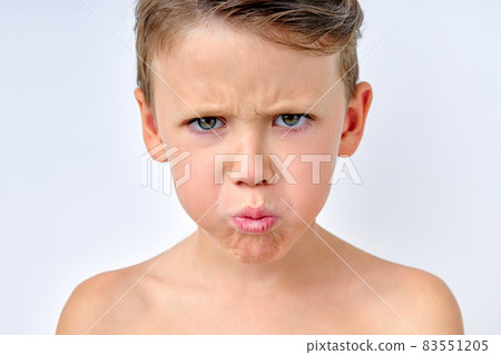 Kid with sad face, Upset little boy, Unhappy child looking out, Spoiled kid alone 83551205