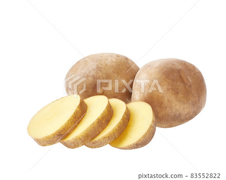 Two potatoes cut in half (slices). Isolated over white background. 83552822