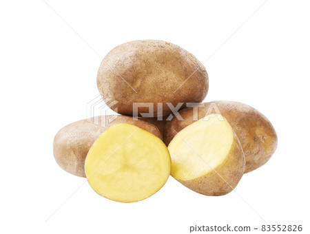 organic potatoes cut in half isolated on white background. 83552826