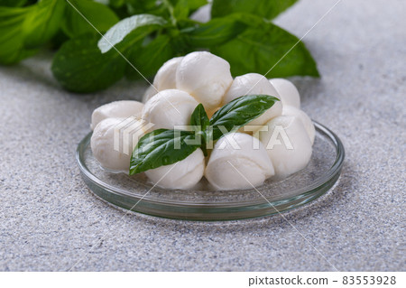 Mozzarella cheese, basil and tomato cherry Mozzarella cheese, basil and tomato cherry 83553928