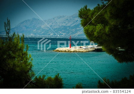 Small lighthouse in Baska Voda, Makarska riviera, Dalmatia, Croatia 83554124