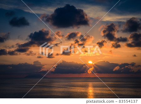 Aerial view of beautiful amazing sea sunset with color dramatic sky Aerial view of beautiful amazing sea sunset with color dramatic sky 83554137