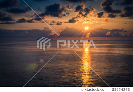 Aerial view of beautiful amazing sea sunset with color dramatic sky Aerial view of beautiful amazing sea sunset with color dramatic sky 83554276