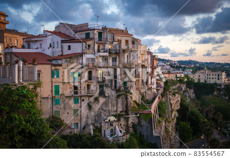 Tropea town colorful stone buildings on top of cliff, Calabria, Italy Tropea town colorful stone buildings on top of cliff, Calabria, Italy 83554567