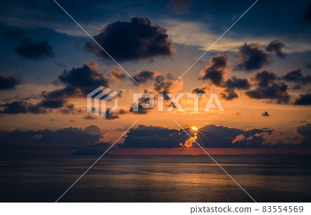 Aerial view of beautiful amazing sea sunset with color dramatic sky Aerial view of beautiful amazing sea sunset with color dramatic sky 83554569
