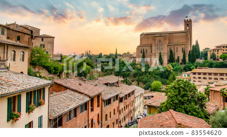 Amazing sunset overlooking the Basilica in Siena. Outstanding landmark building in very rare sunset 83554620