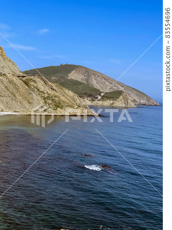 Scenic View Of Sea Against Clear Blue Sky - stock photo Scenic View Of Sea Against Clear Blue Sky - stock photo 83554696