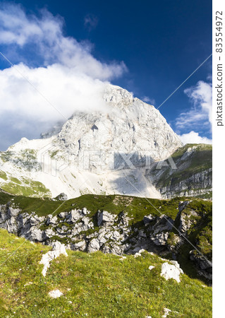 Mangart mountain, Triglav national park, Julian Alps, Slovenia Mangart mountain, Triglav national park, Julian Alps, Slovenia 83554972