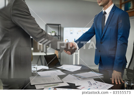 Businessmen Shaking Hands Side View 83555573