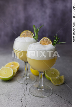 cocktail drink alcoholic whiskey sauer with lime cocktail drink alcoholic whiskey sauer with lime 83555956
