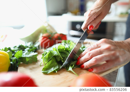 Greenery and peppers on desk 83556206