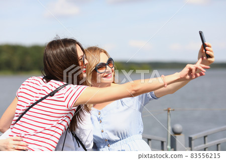 Attractive female take picture 83556215