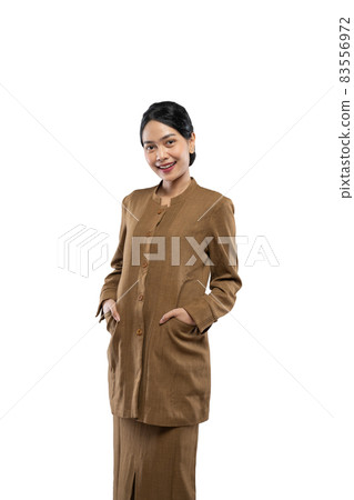 Beautiful civil servant woman smiling wearing uniform while standing Beautiful civil servant woman smiling wearing uniform while standing 83556972