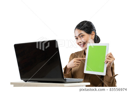 Smiling woman in civil servant uniform using laptop to work 83556974