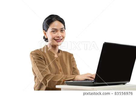 Smiling woman in civil servant uniform using laptop to work 83556976