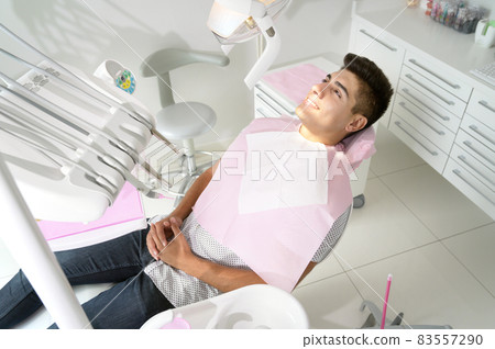 Young Patient in modern dental clinic. 83557290