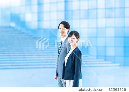 Business people (men and women) lined up in the aisle Business people (men and women) lined up in the aisle 83563826